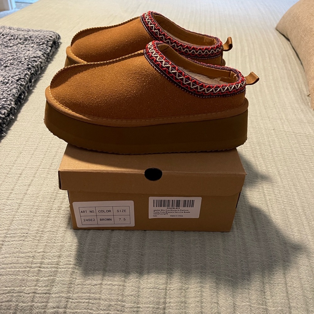 Brown women’s platform slippers